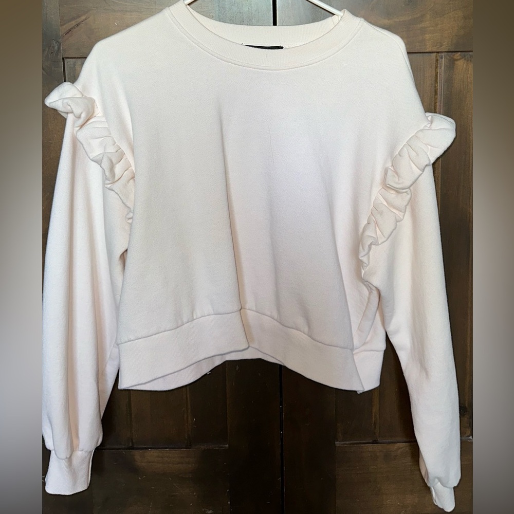 Cream ruffle sweater